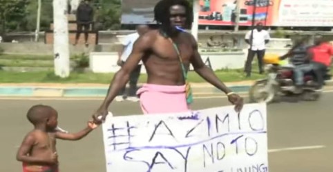 Kisumu Man Wrapped In Towel Takes Son To Azimio Demos